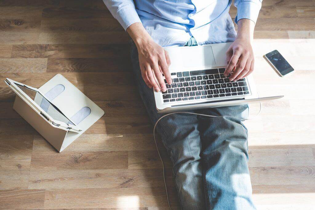 elegant business multitasking multimedia man elegant business multitasking multimedia man using devices at home
